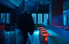 Blue and red lighting scenography by ATO Designs at Lowkey Paris